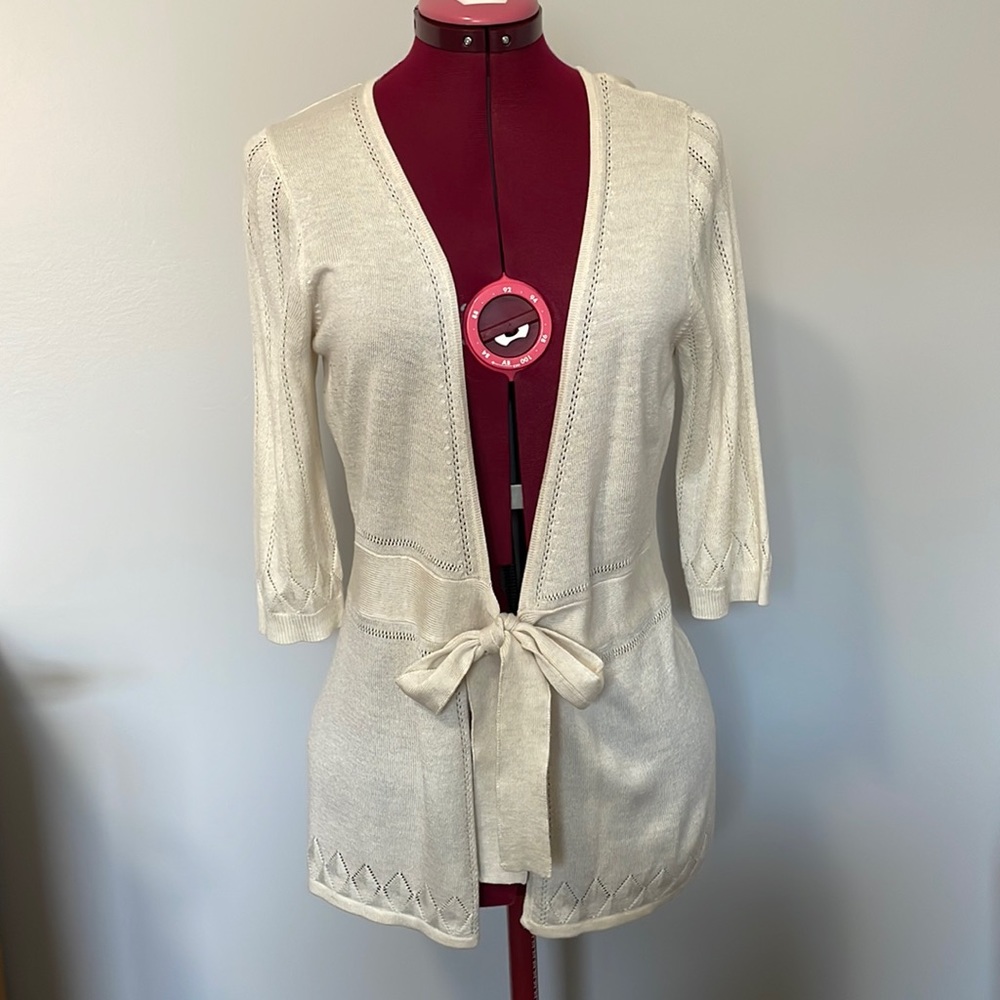 Cream-coloured lacy cardigan